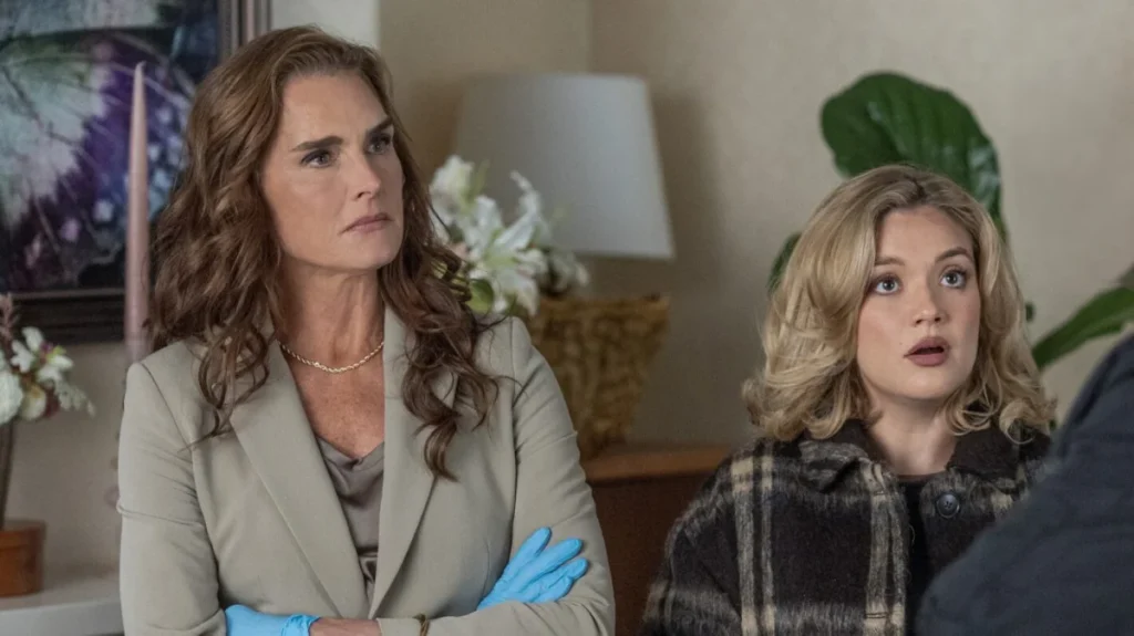 Close-up shot of Brooke Shields and Amalia Williamson starring in the Acorn TV mystery series You're Killing Me.